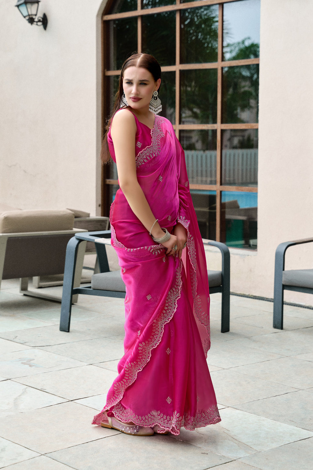 Pink fancy shimmer chiffon saree with embroidery work