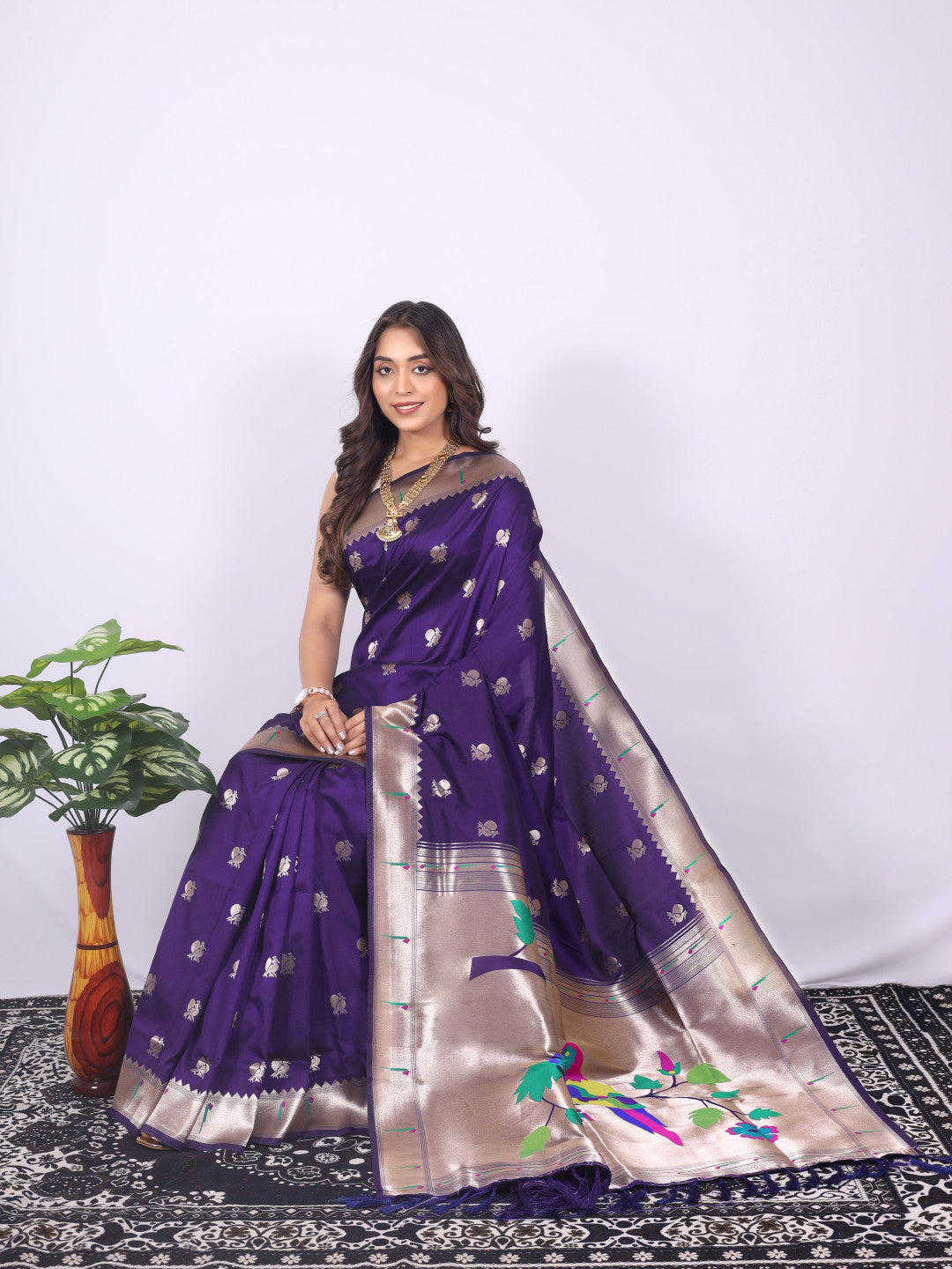Violet color paithani silk saree with zari weaving work