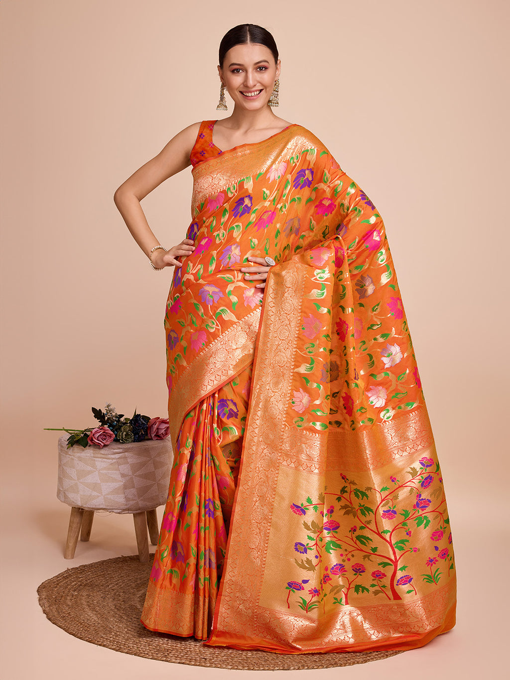 Orange color paithani silk saree with zari weaving work