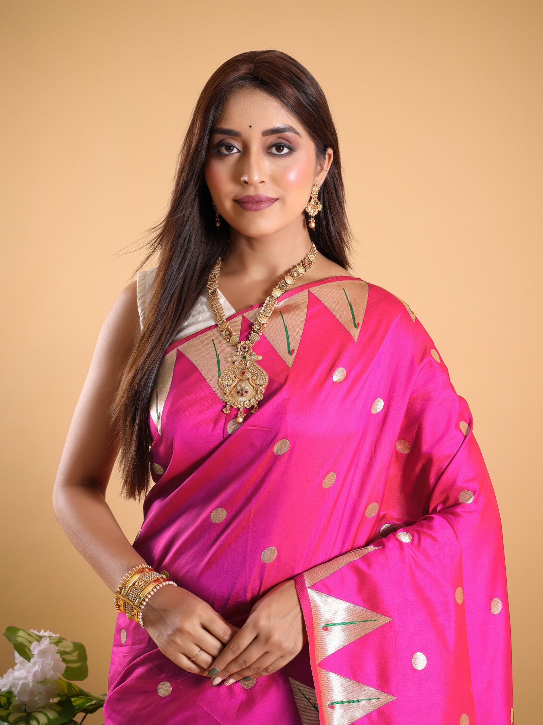 Rani pink color paithani silk saree with zari weaving work