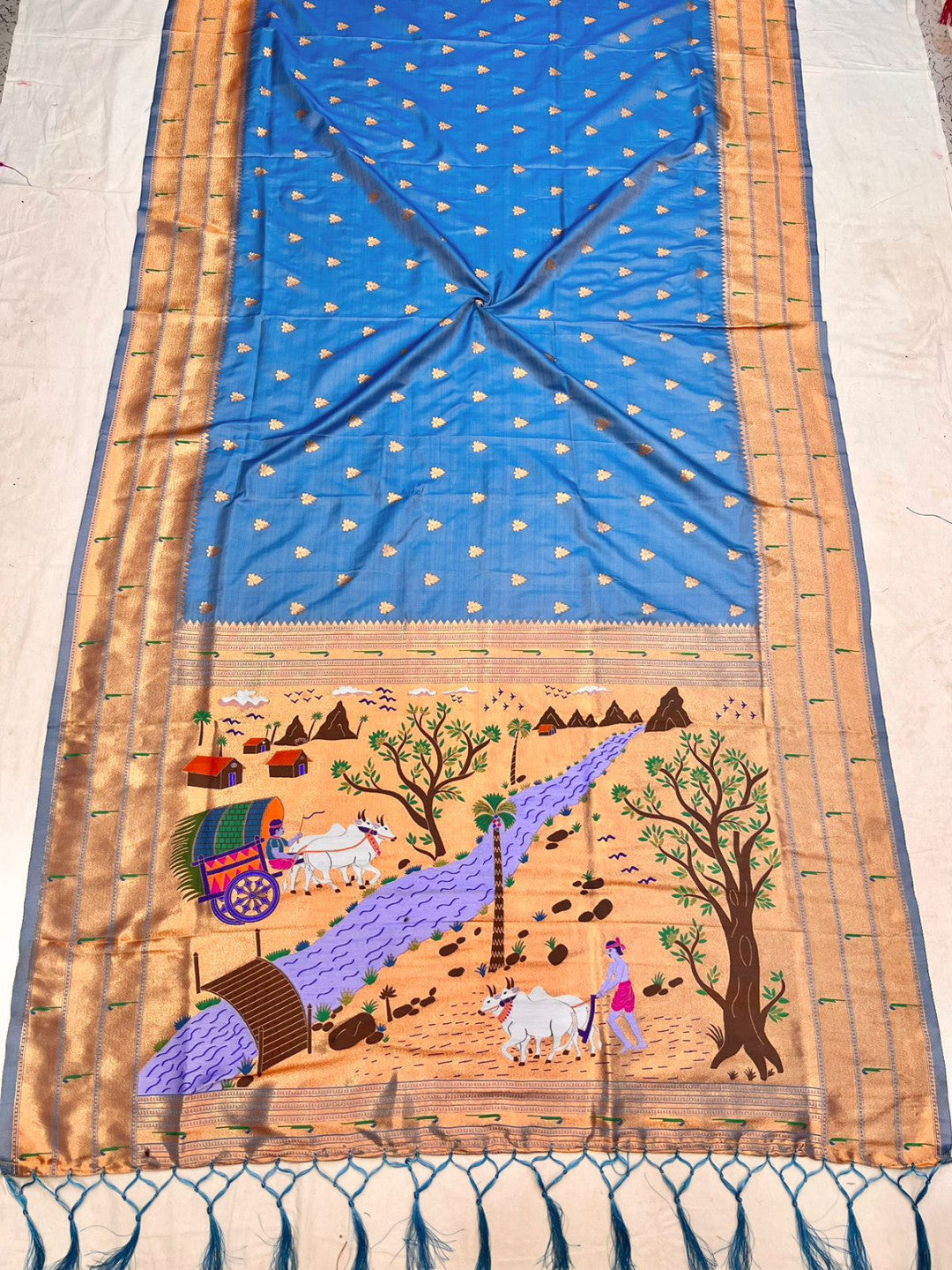 Powder blue color paithani silk saree with zari weaving work