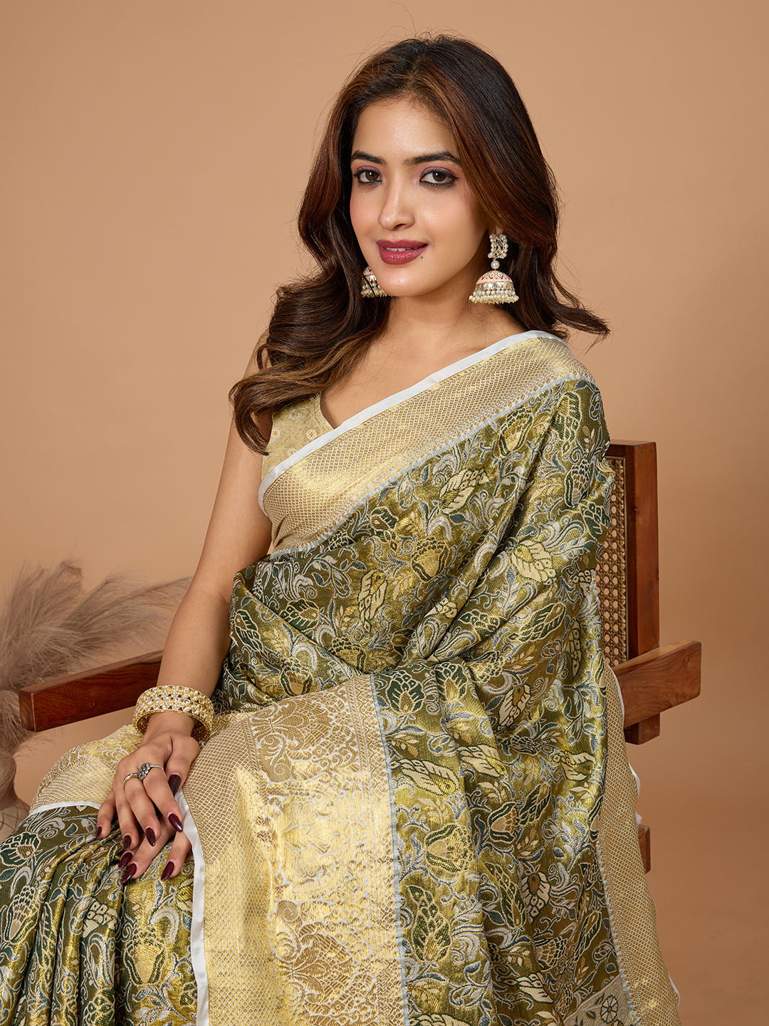 Mahendi green kanjivaram silk saree with zari weaving work