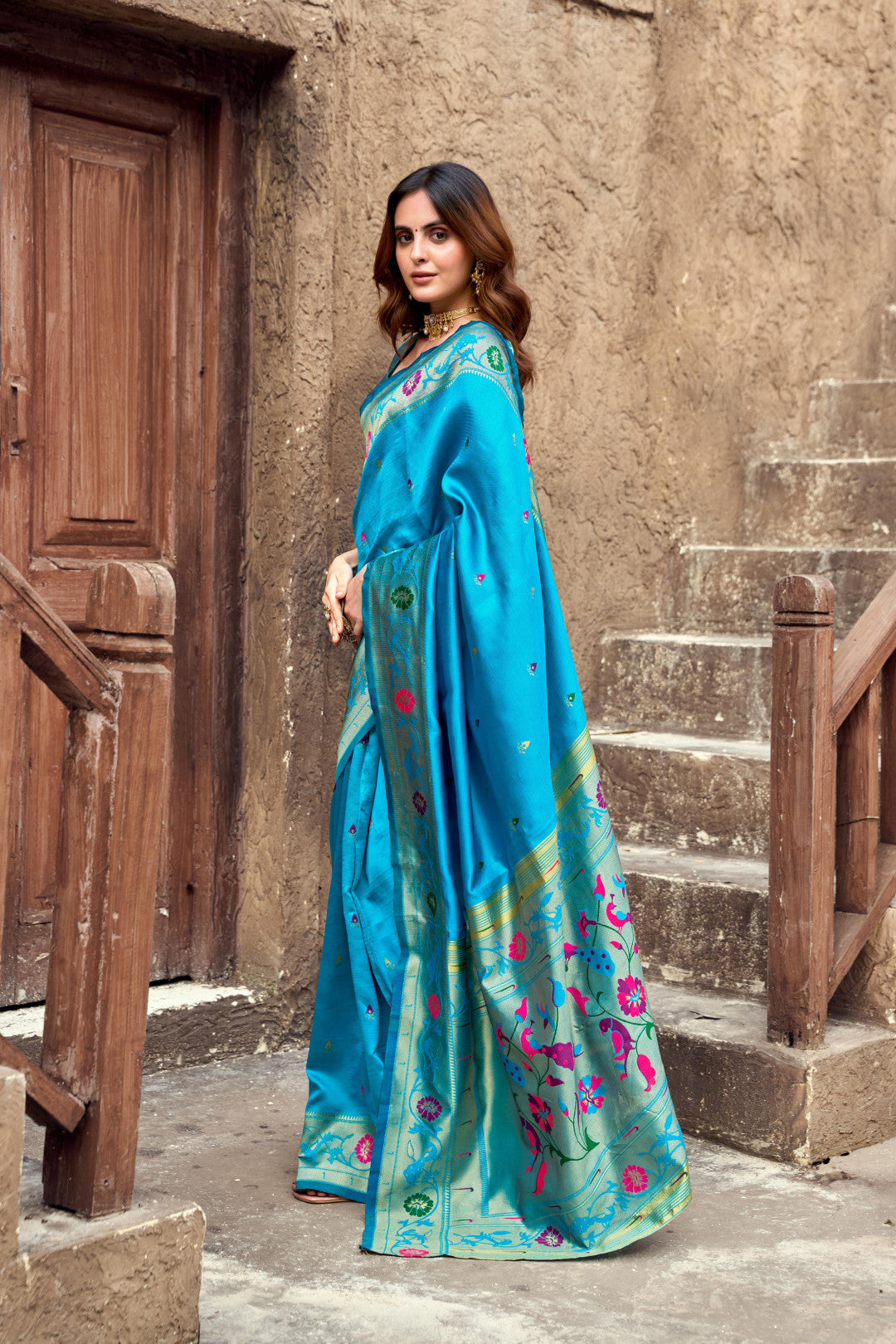 Traditional blue paithani silk saree with zari weaving work