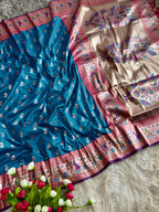 Sky blue traditional paithani silk saree with peacock zari weaving work