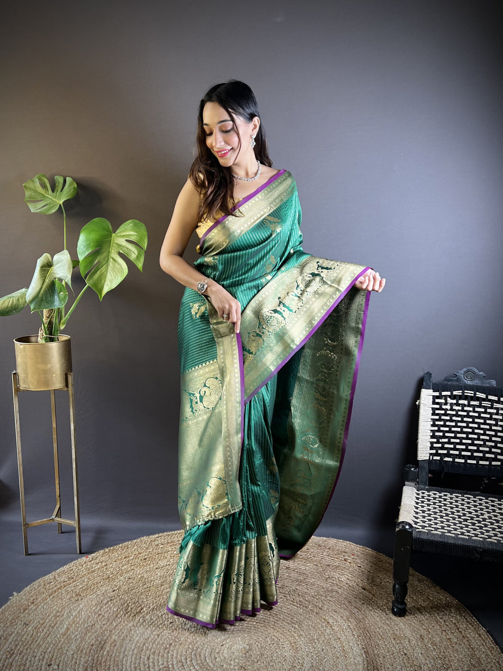 Green kanchipuram silk saree with golden zari weaving work