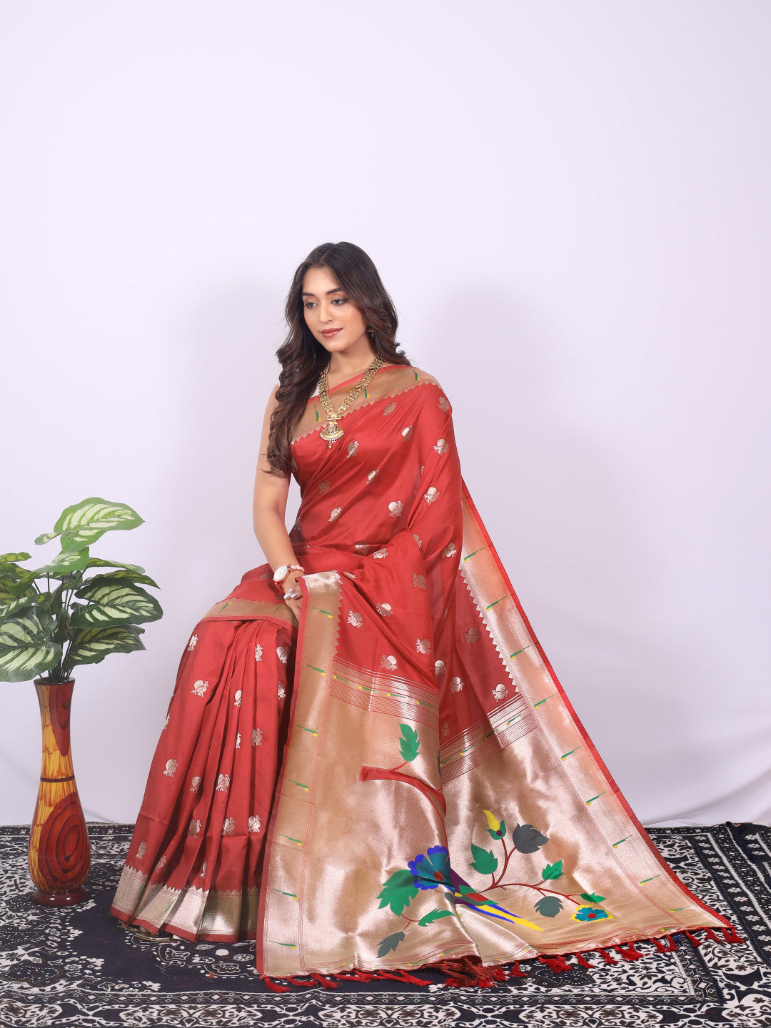 Red color paithani silk saree with zari weaving work