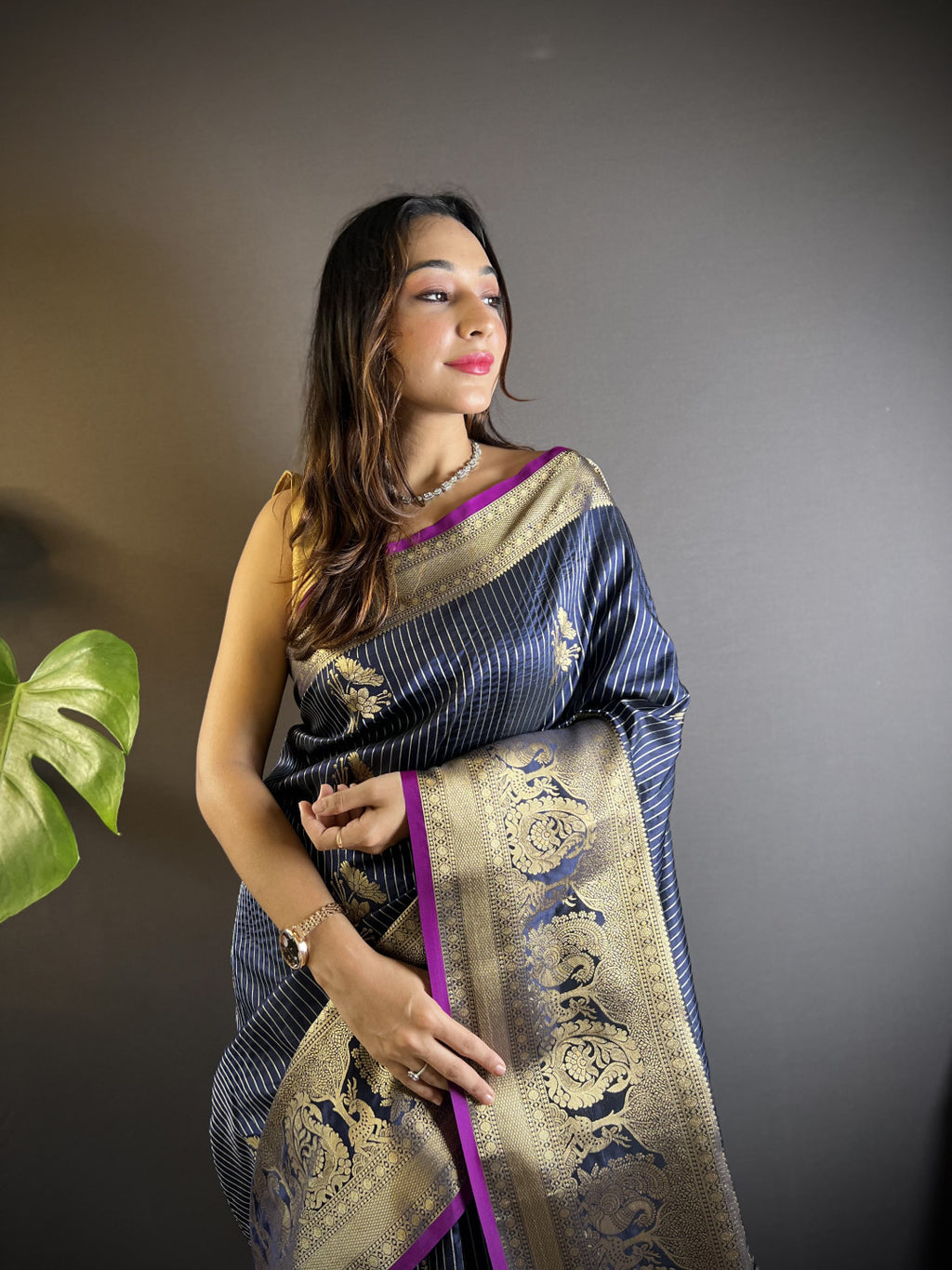 Navy blue kanchipuram silk saree with golden zari weaving work