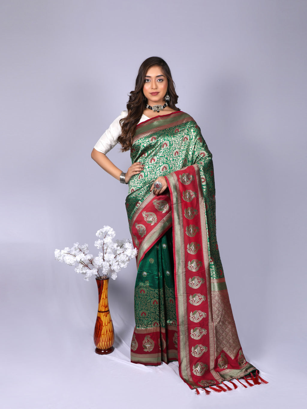 Green color kanchipuram silk saree with zari weaving work