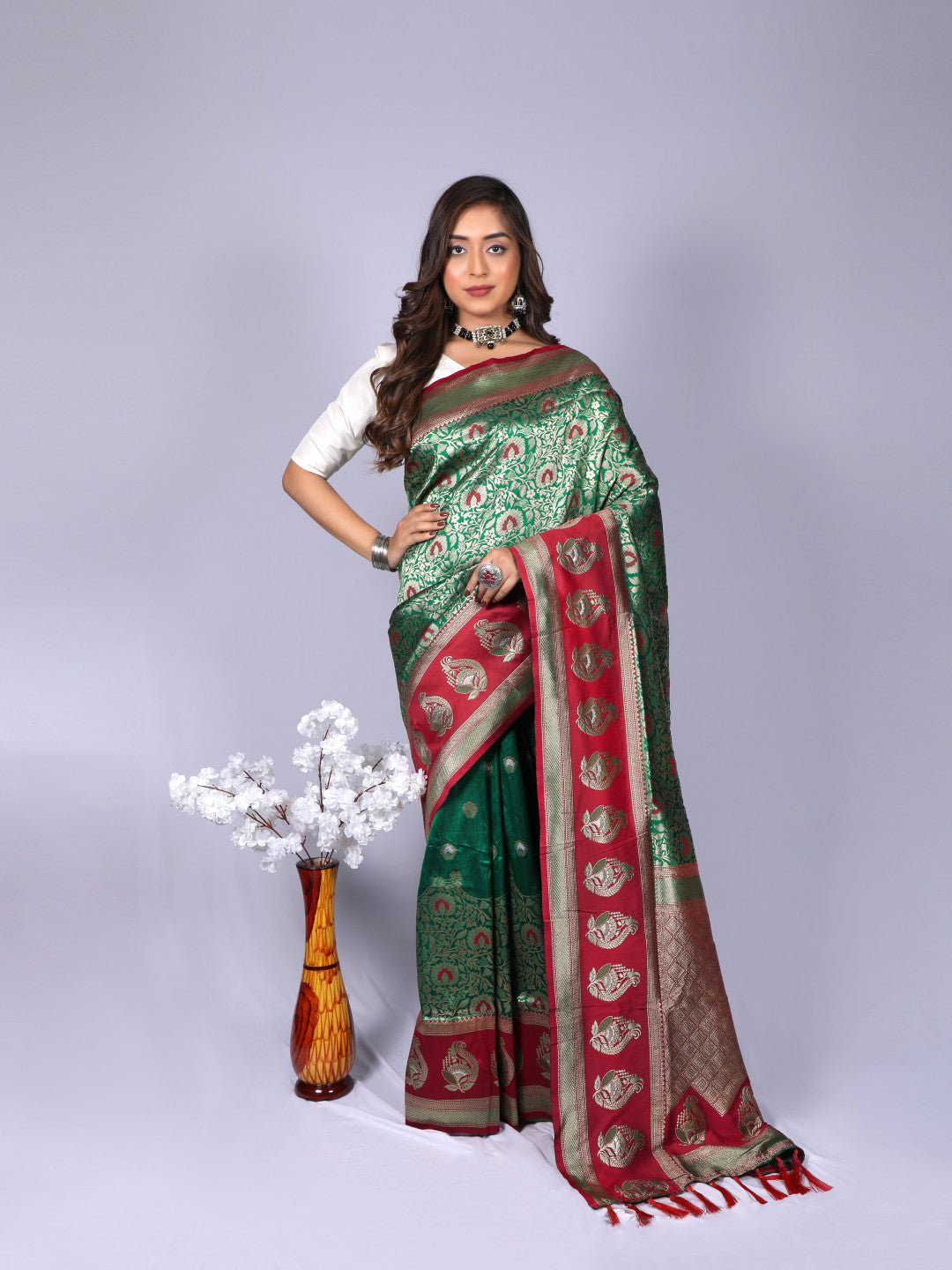 Green color kanchipuram silk saree with zari weaving work