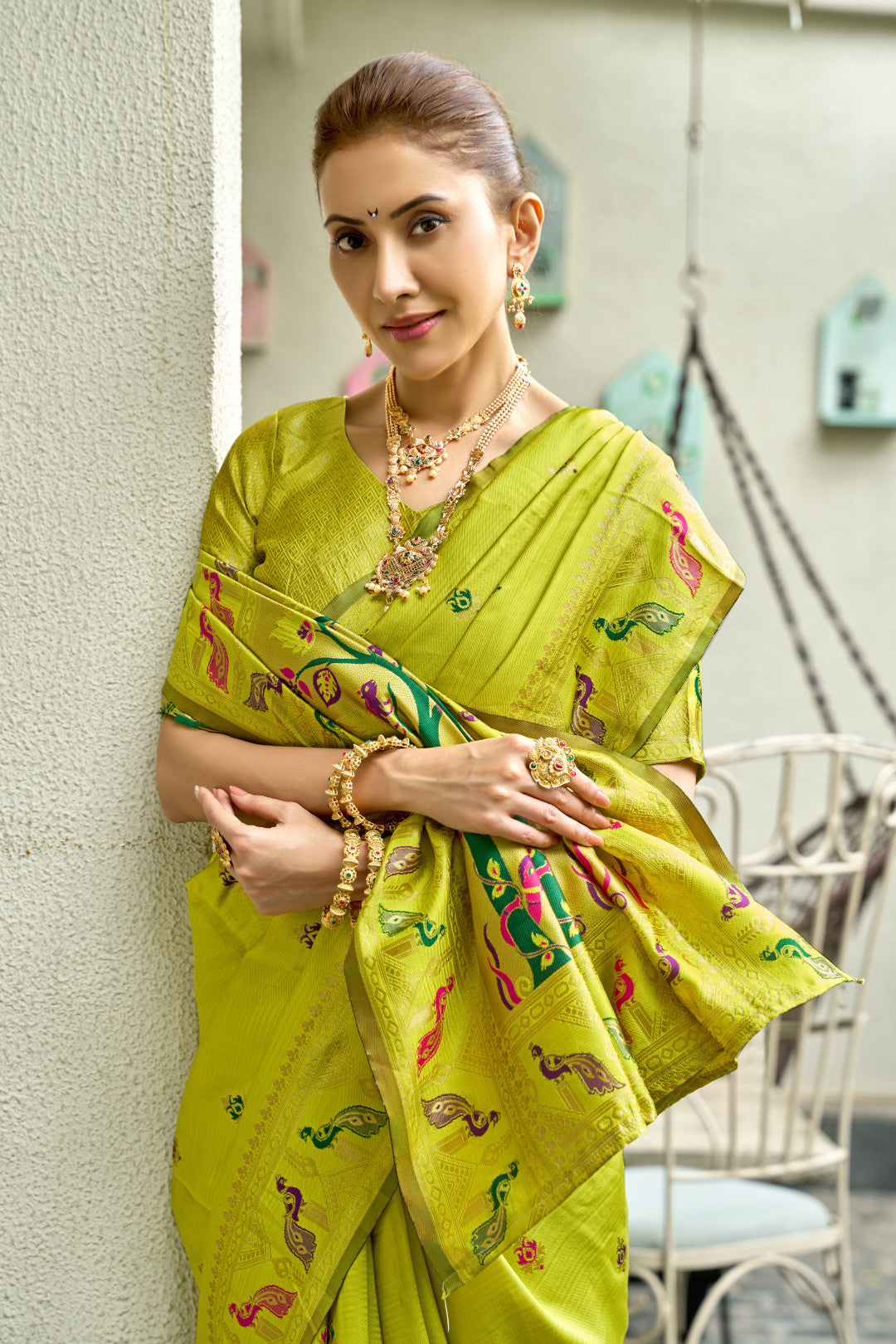 Traditional parrot green paithani silk saree with zari weaving work