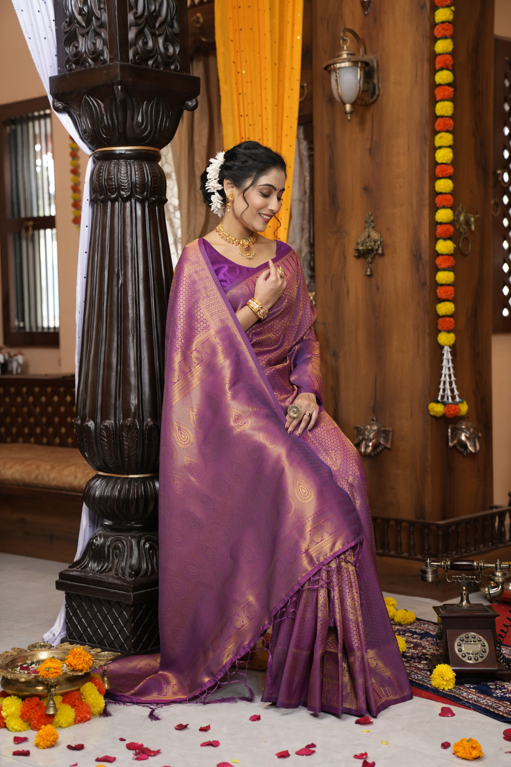 Purple color kanjivaram silk saree with zari weaving work