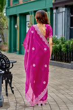 Rani pink fancy shimmer chiffon saree with embroidery work