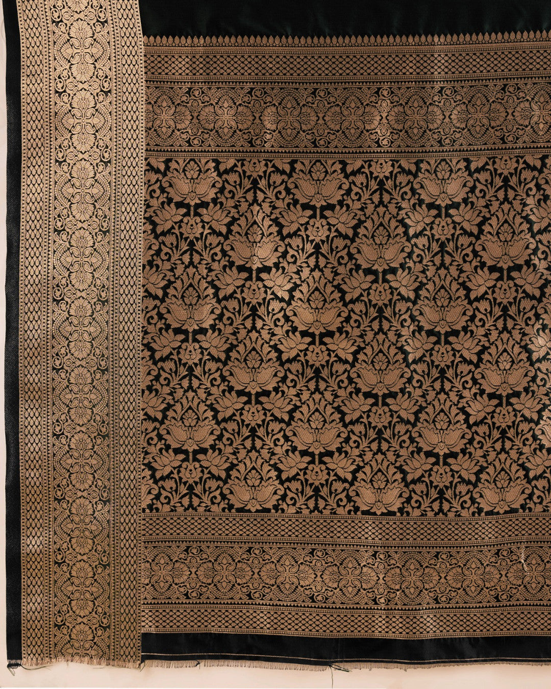 Black color soft kanchipuram silk saree with zari weaving work