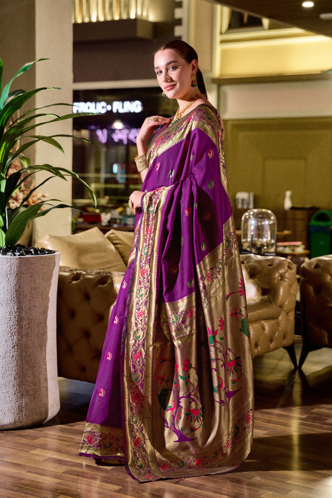 Traditional magenta paithani silk saree with zari weaving work