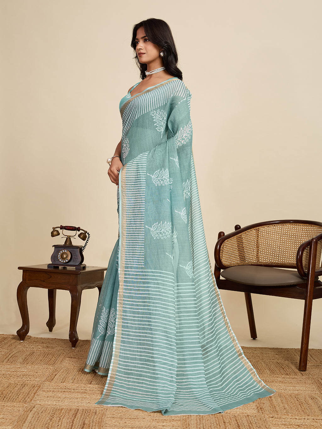 Sea green linen cotton saree with digital printed work and silver zari border