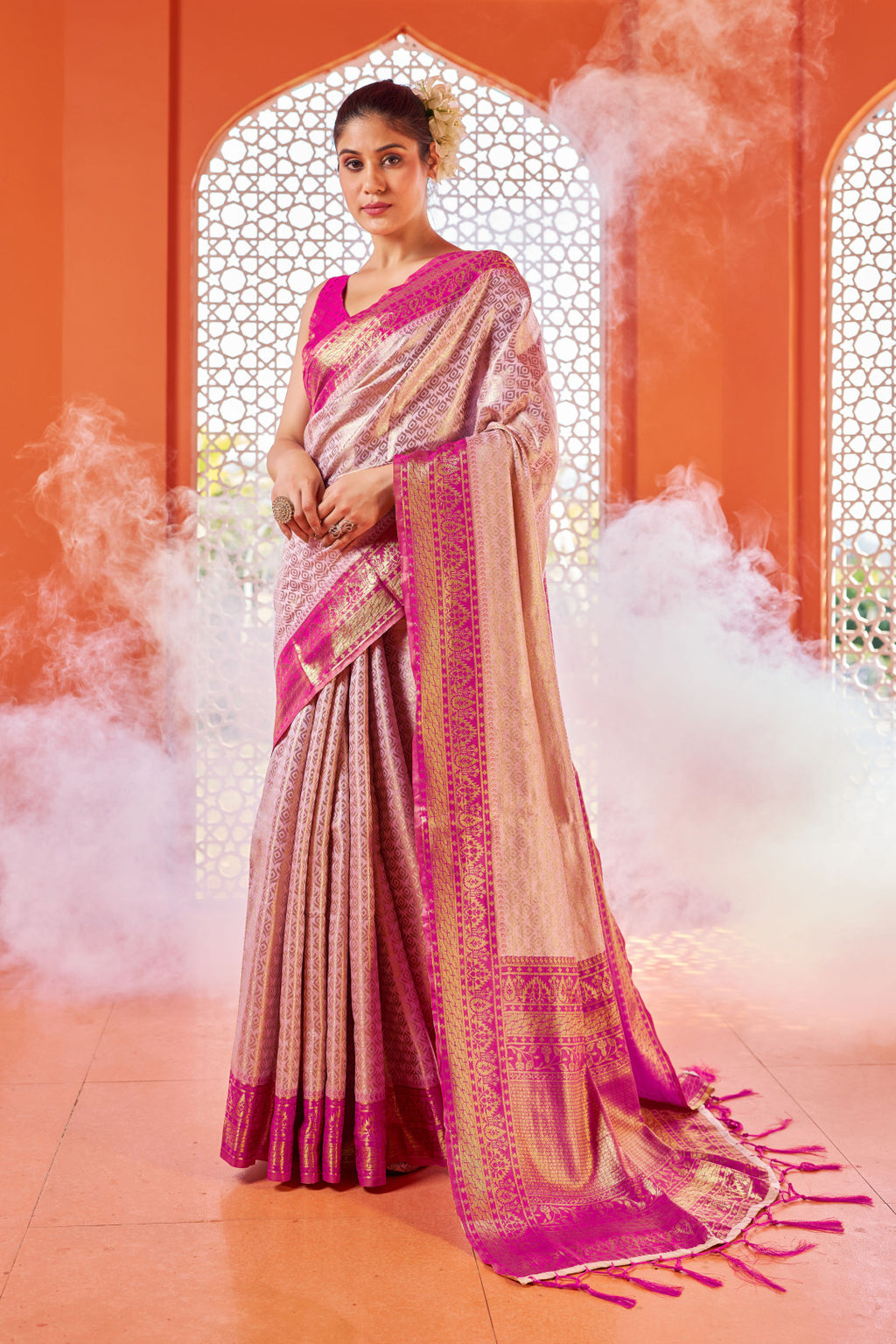 Pink color soft kanjivaram silk saree with zari weaving work
