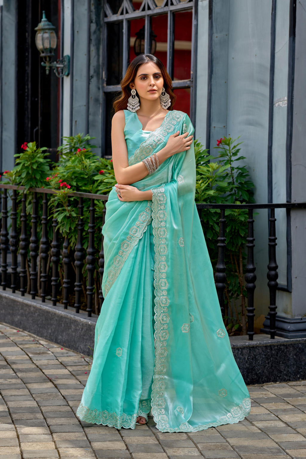 Sea green fancy shimmer chiffon saree with embroidery work
