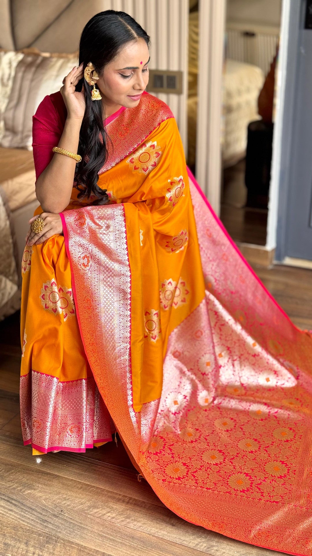 Orange luxurious banarasi silk saree with zari weaving work