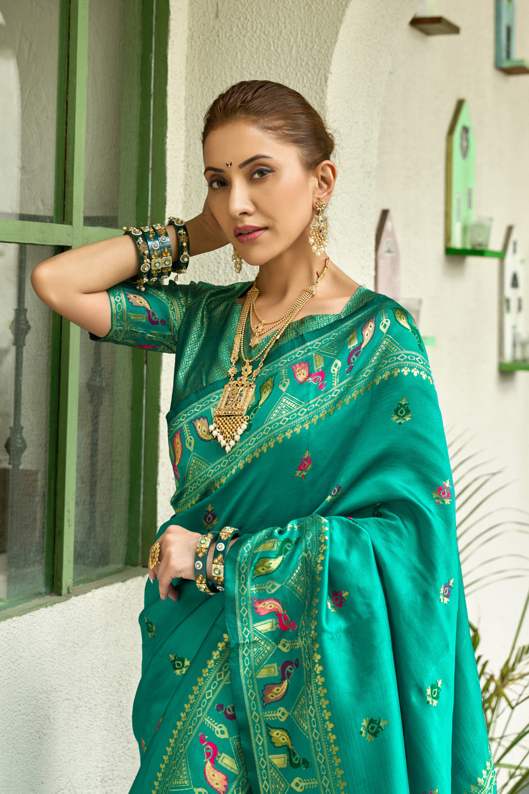 Traditional rama green paithani silk saree with zari weaving work