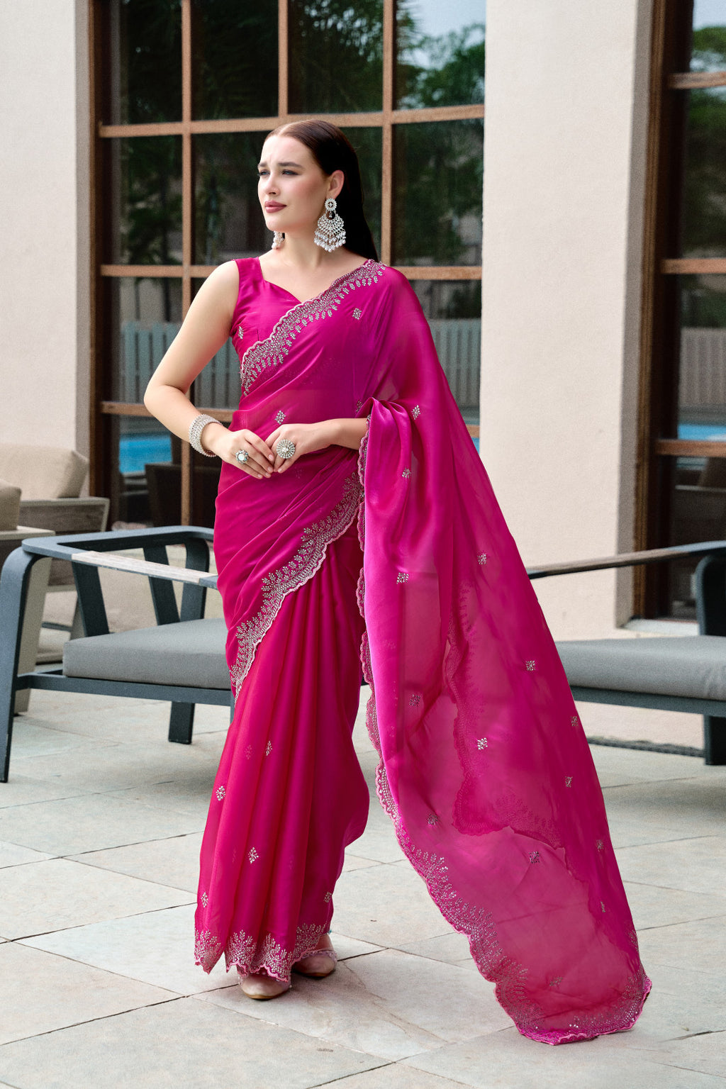 Pink fancy shimmer chiffon saree with embroidery work
