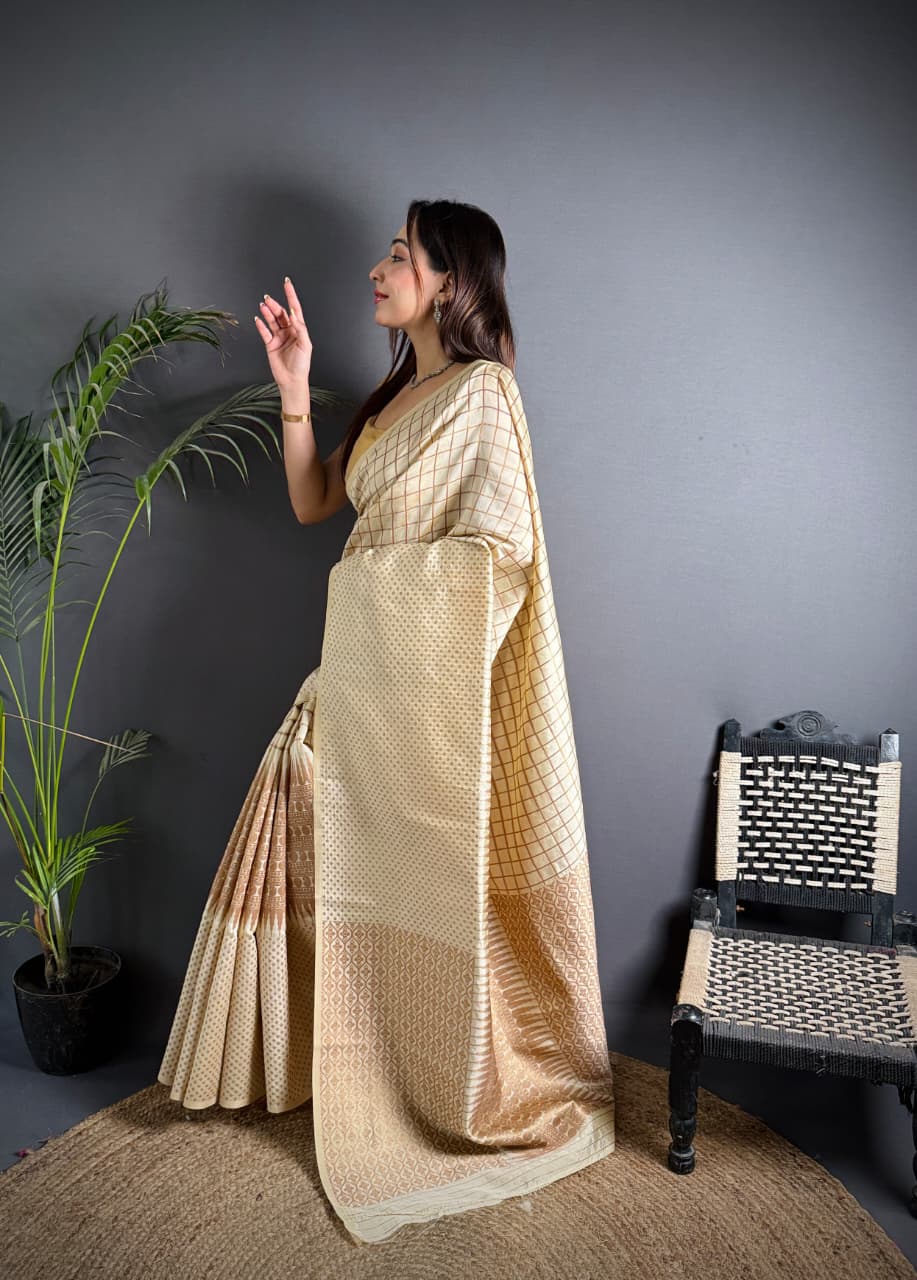 Off white color banarasi silk saree with zari weaving work