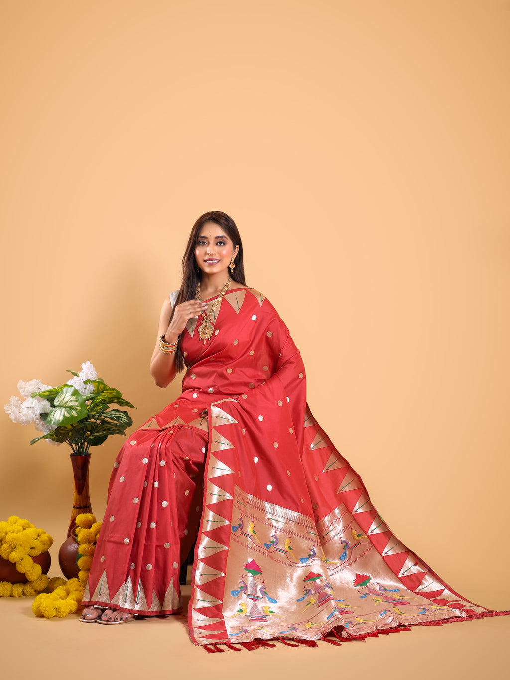 Red color paithani silk saree with zari weaving work