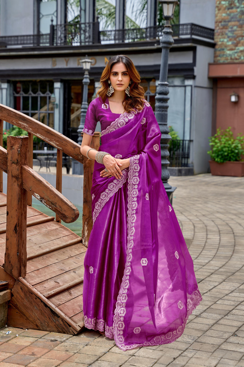 Magenta fancy shimmer chiffon saree with embroidery work