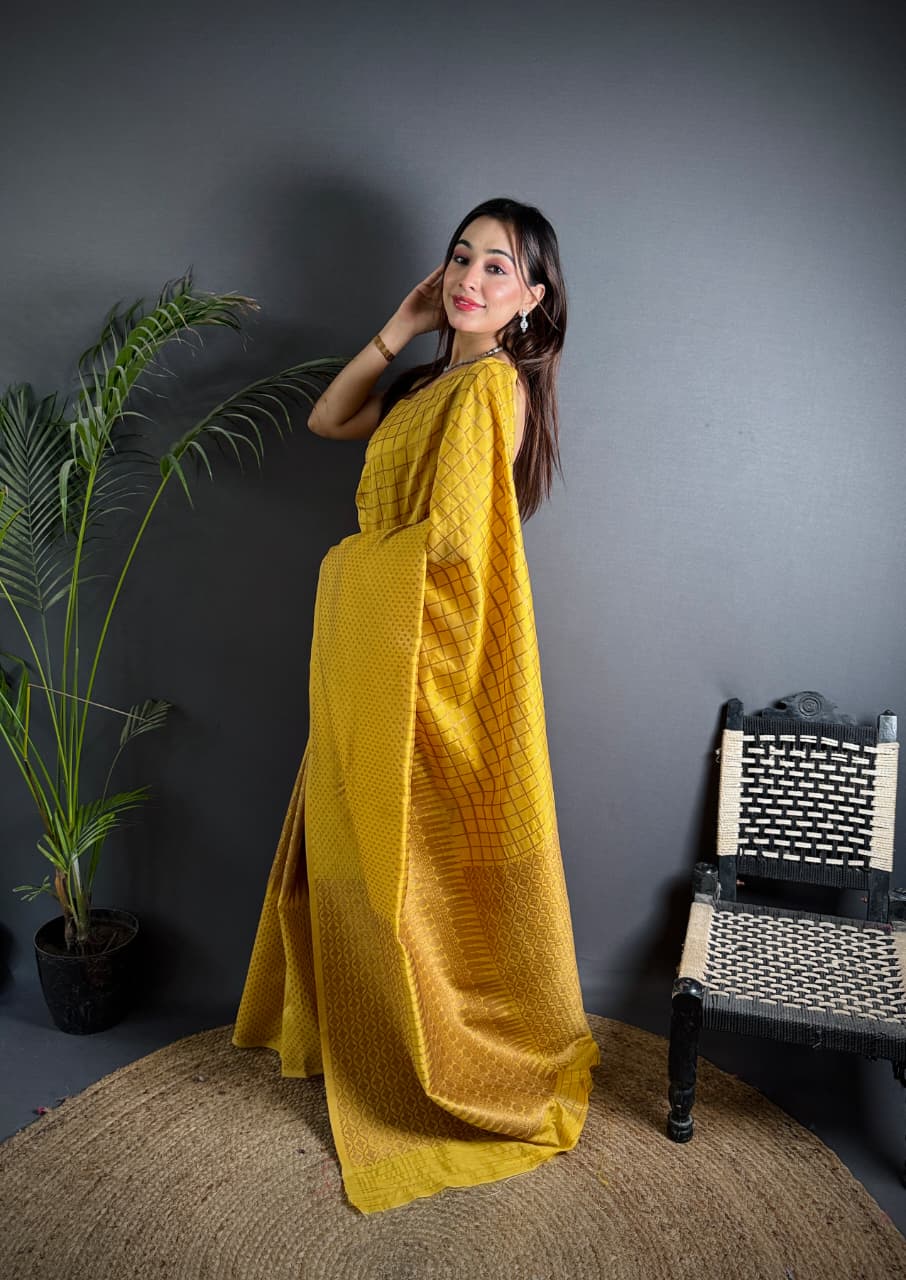 yellow color banarasi silk saree with zari weaving work