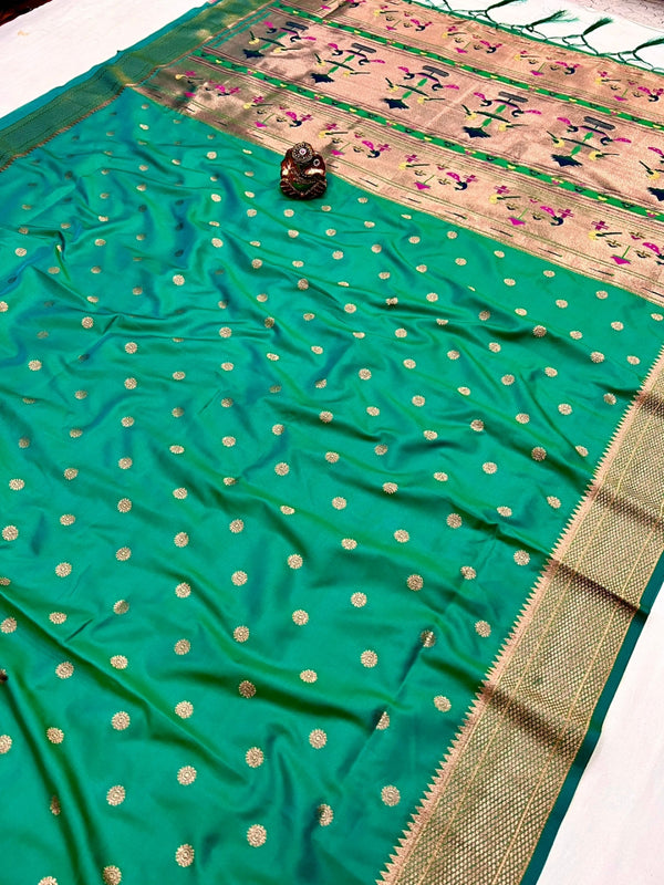 Rama green color paithani silk saree with copper zari weaving work