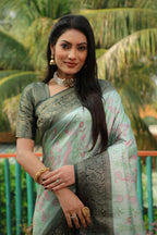 Sea green color kanjivaram silk saree with zari weaving work