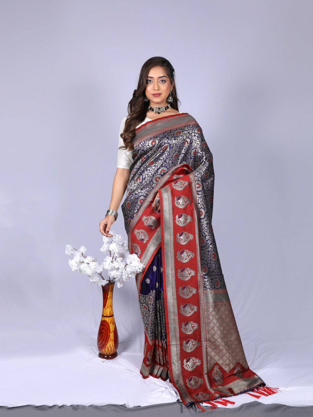 Navy blue color kanchipuram silk saree with zari weaving work