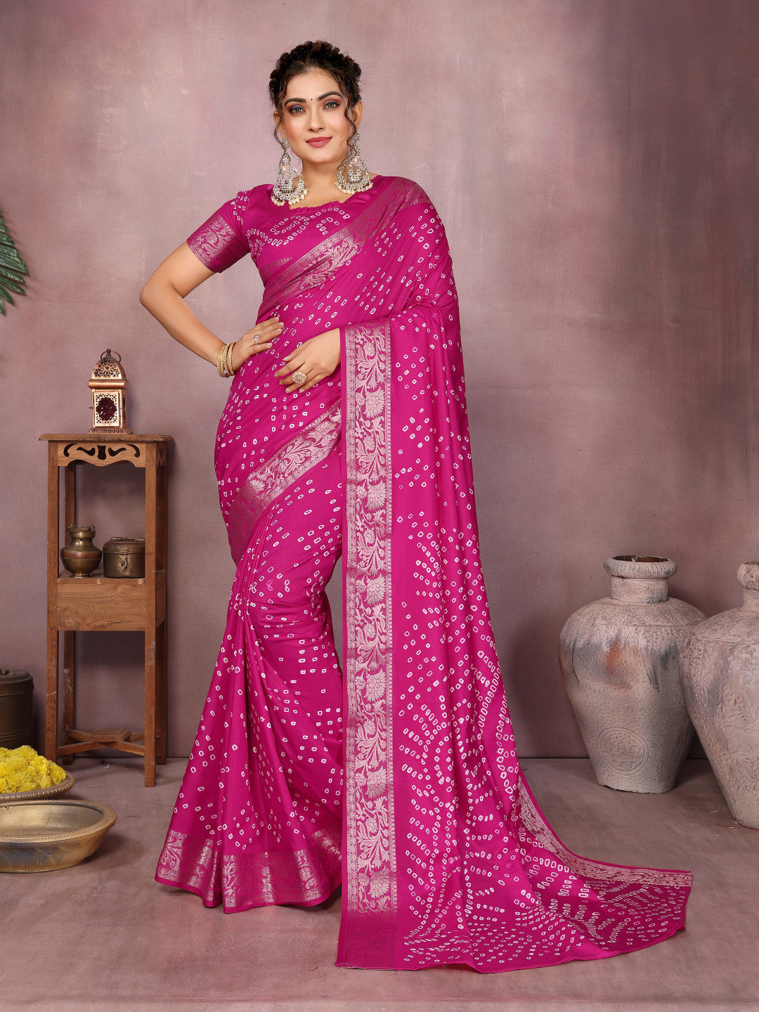 Pink colour hand bandhej bandhani saree with zari weaving work