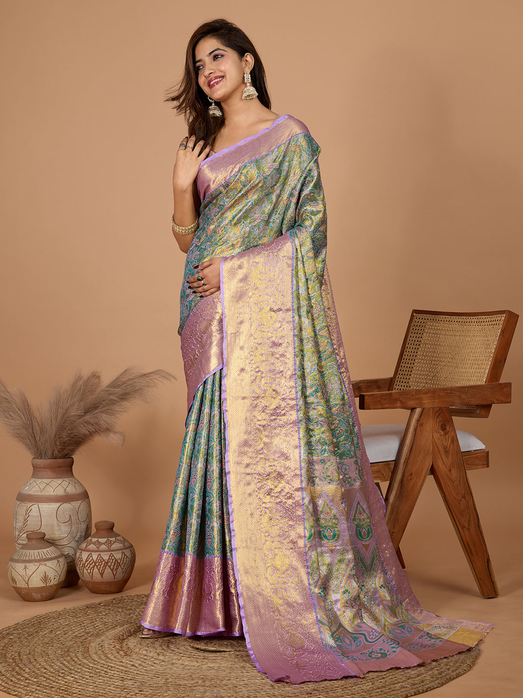 Green kanjivaram silk saree with zari weaving work