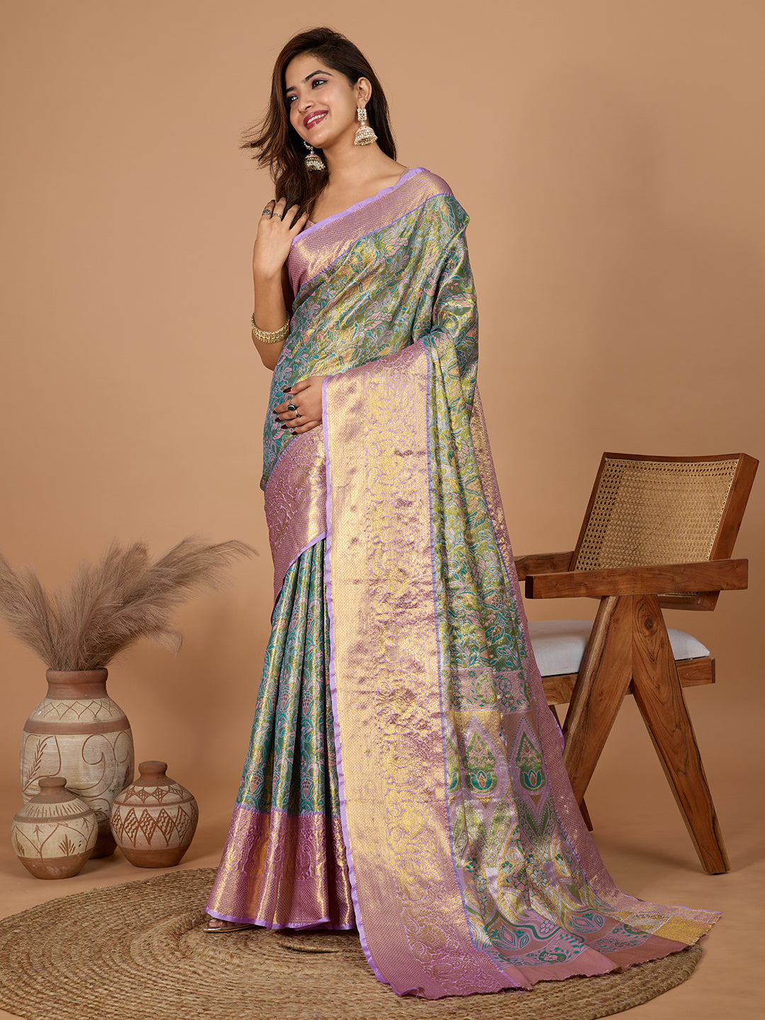 Green kanjivaram silk saree with zari weaving work