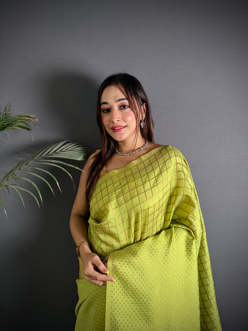 Parrot green color banarasi silk saree with zari weaving work