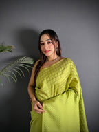Parrot green color banarasi silk saree with zari weaving work