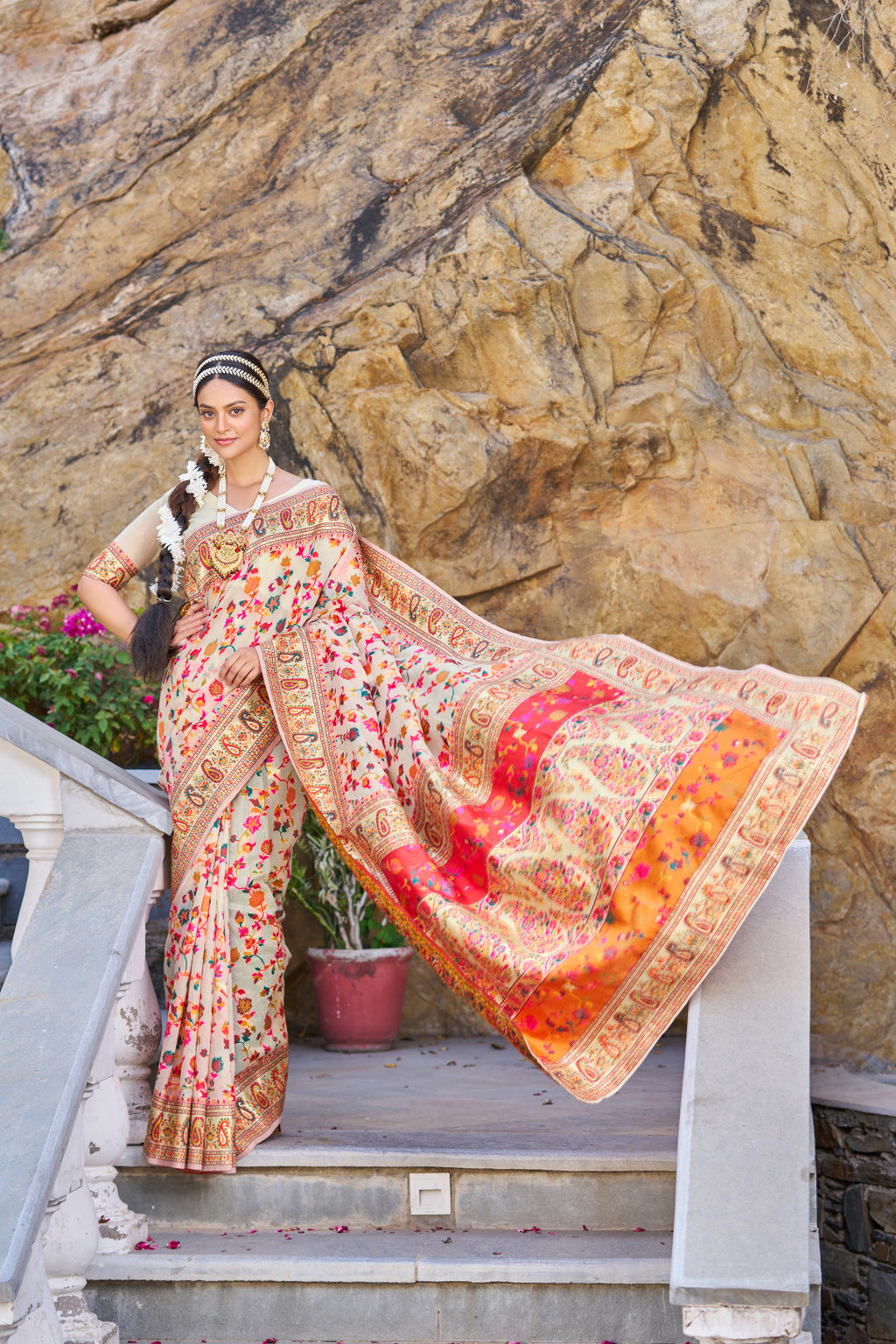 Off white color banarasi silk saree with zari weaving work