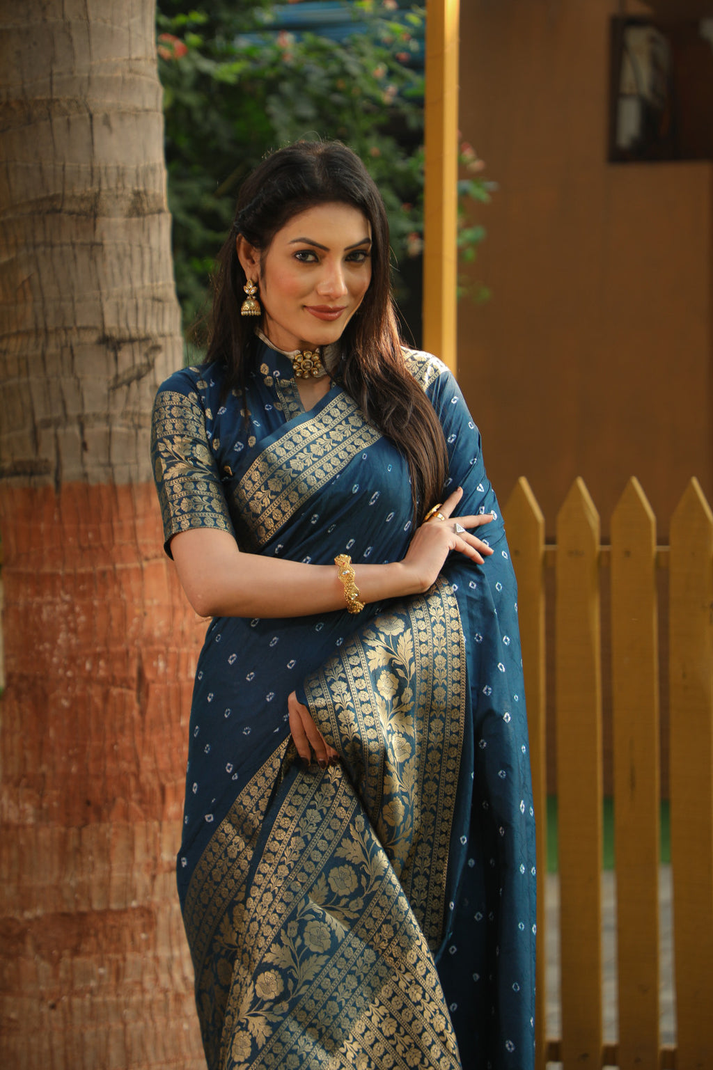 Firoji color bandhej silk saree with zari weaving work