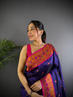 Purple colour paithani silk saree with zari weaving work