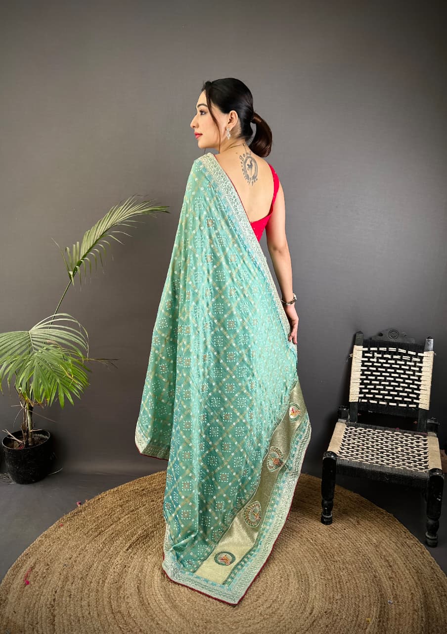 Sea green traditional blooming vichitra khadi bandhej silk saree with sequence work