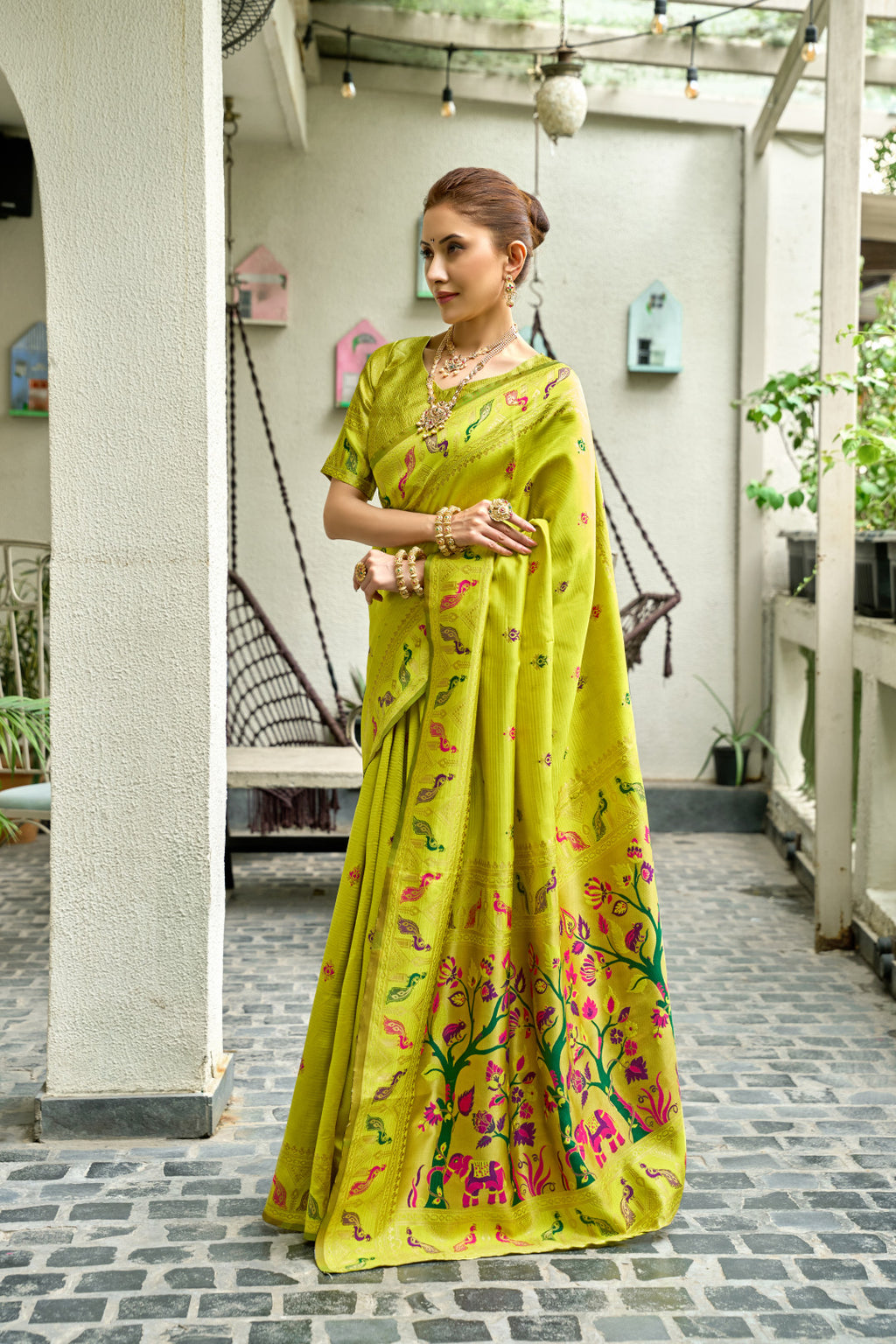 Traditional parrot green paithani silk saree with zari weaving work