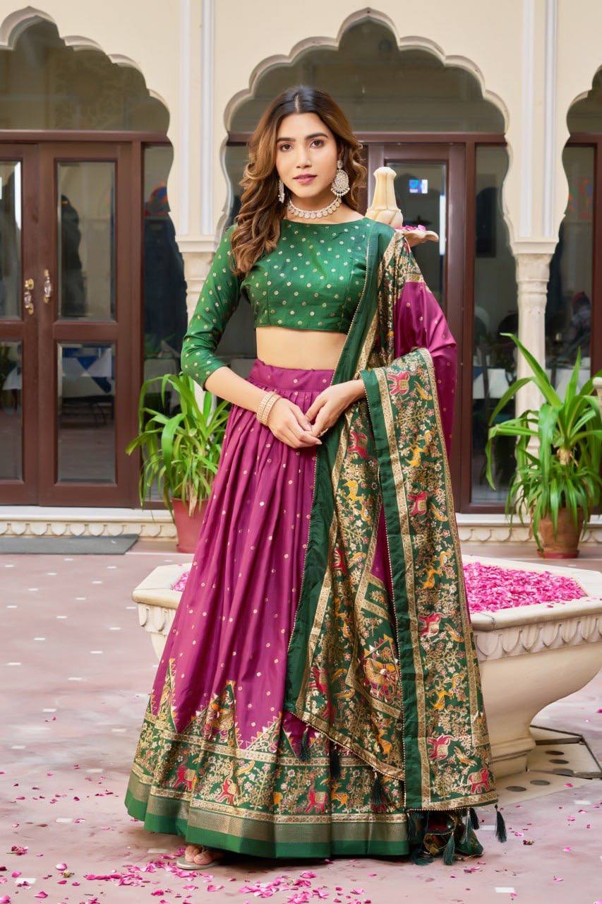 Magenta and green color dola silk lehenga with patola printed work