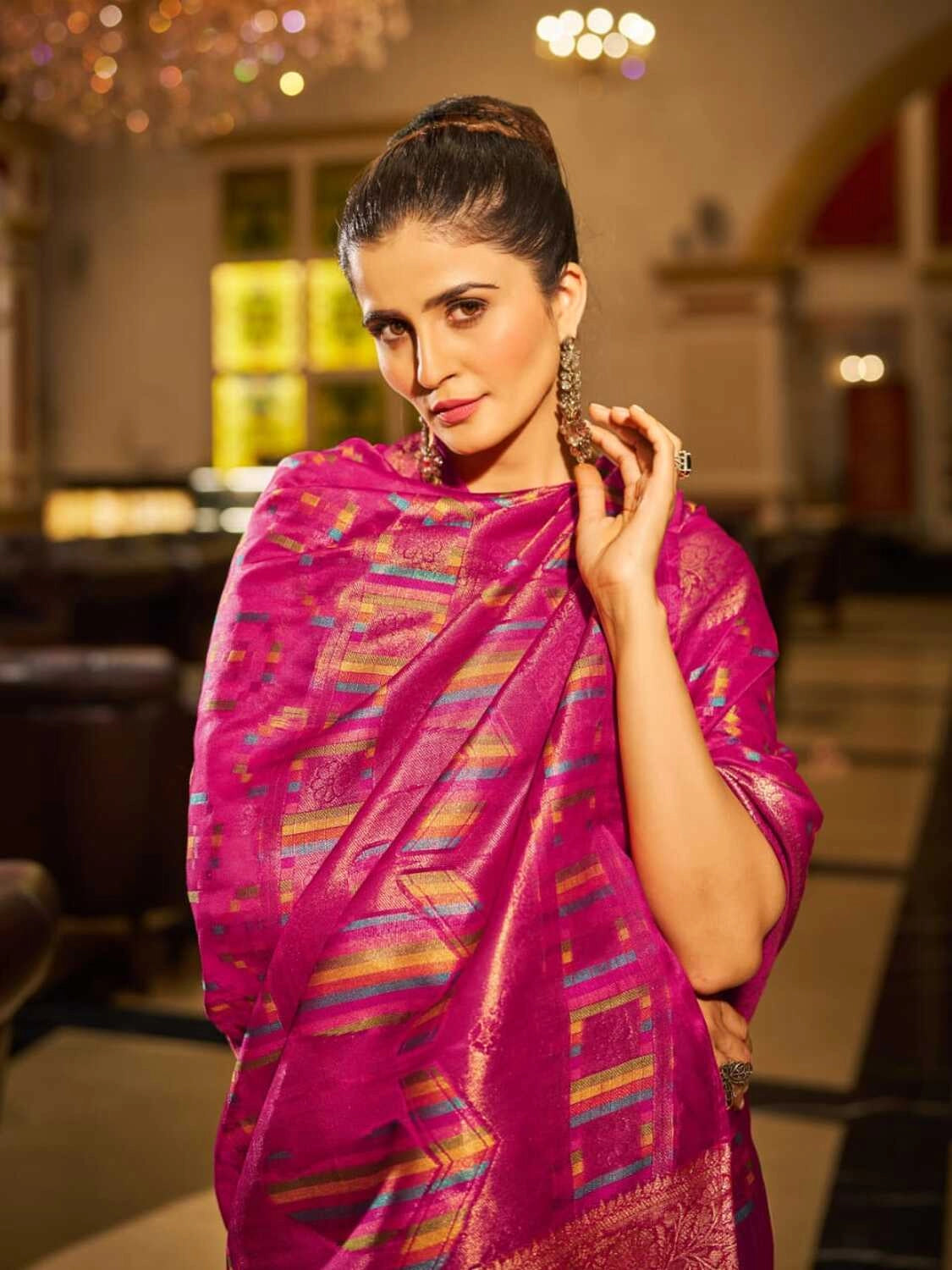 Rani pink soft organza silk saree with zari weaving work