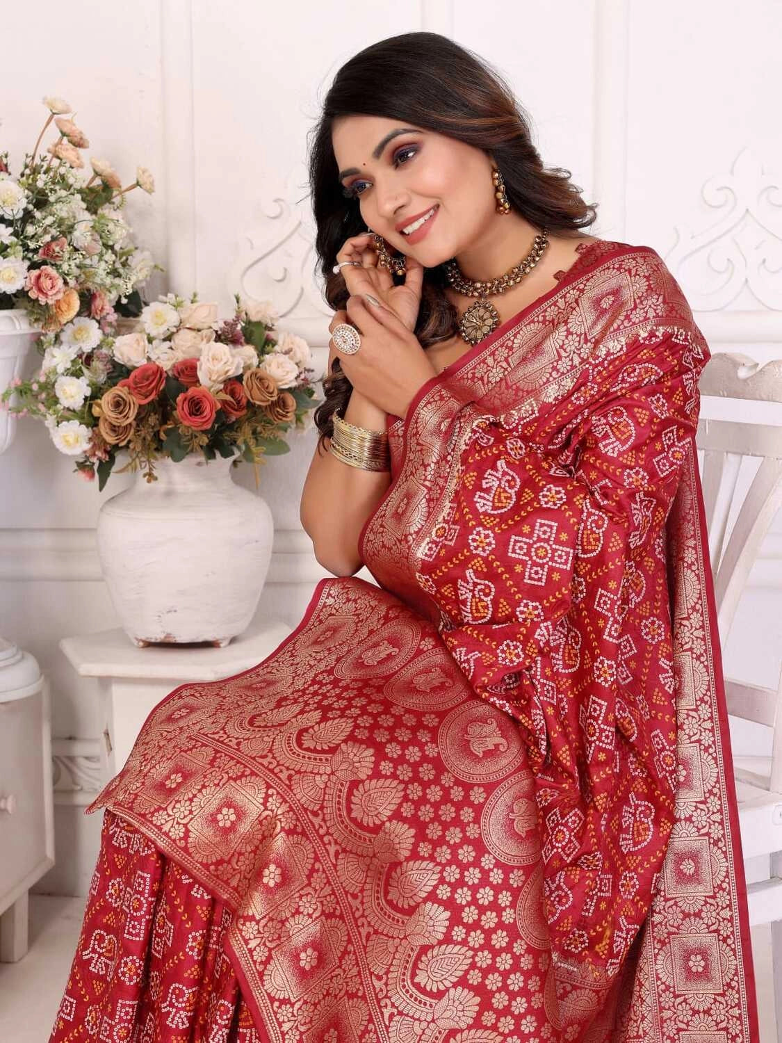 Maroon satin silk bandhej saree with zari weaving border & pallu