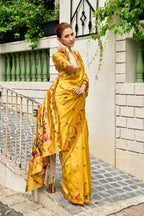 Traditional yellow paithani silk saree with zari weaving work