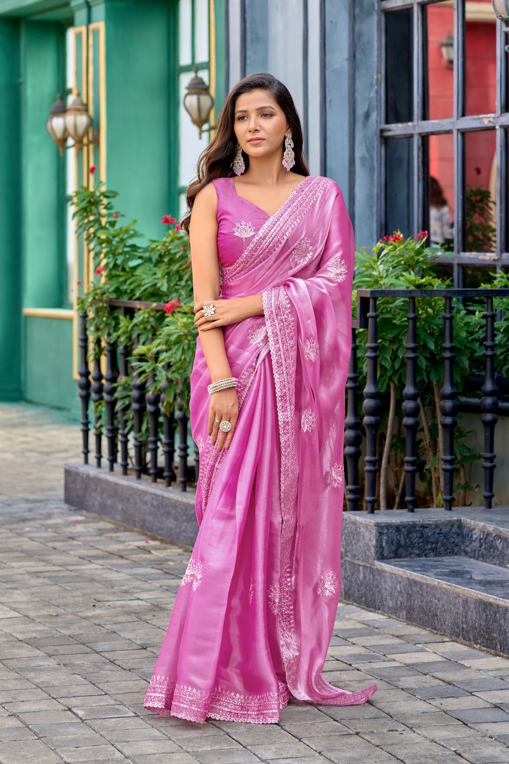 Baby pink fancy shimmer chiffon saree with embroidery work
