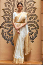 Off white soft banarasi silk saree with zari weaving work