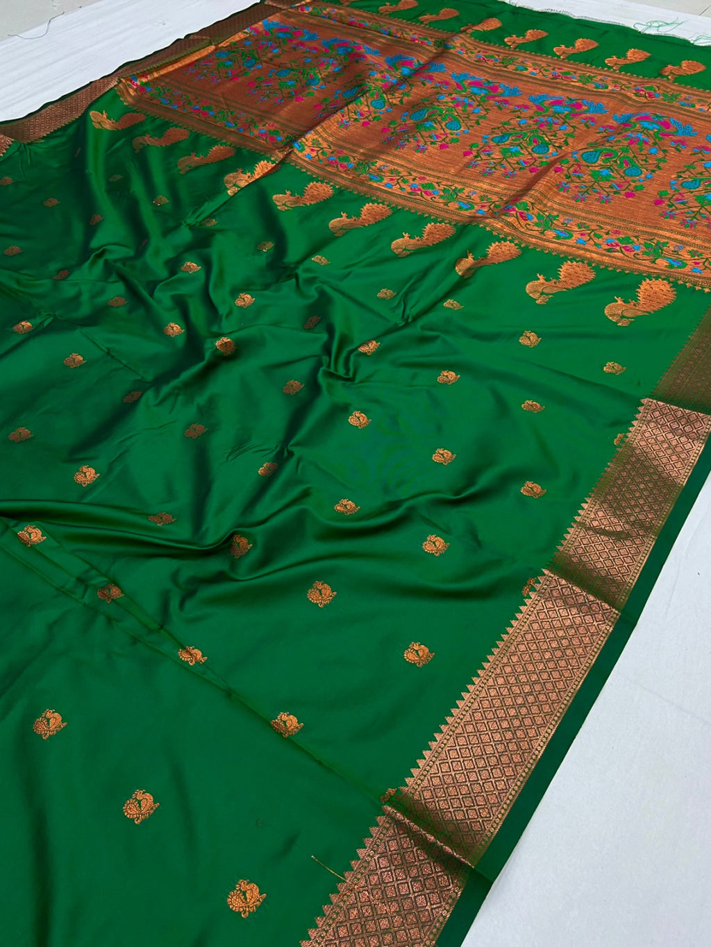 Green color paithani silk saree with zari weaving work