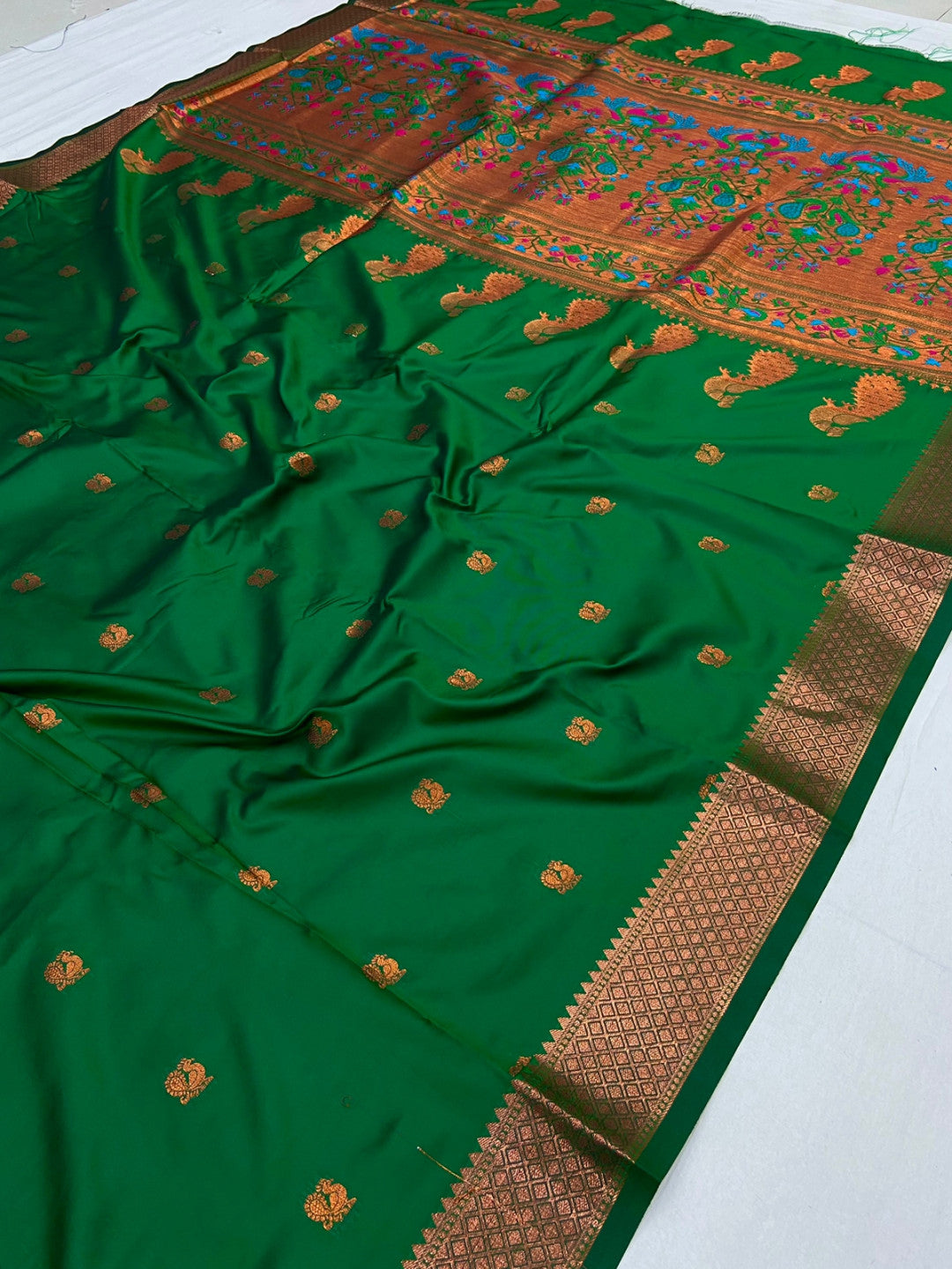 Green color paithani silk saree with zari weaving work