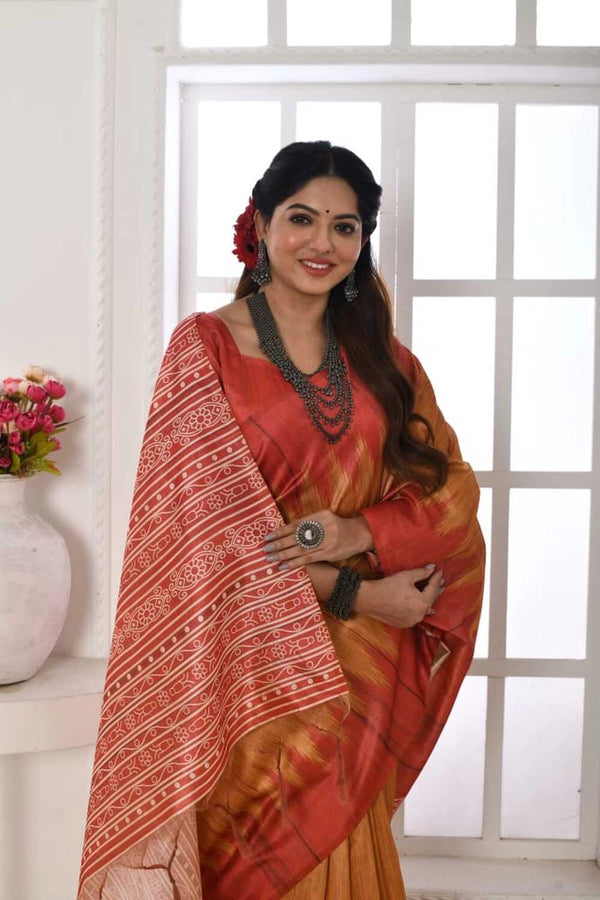 Mustard yellow color tussar silk saree with printed work